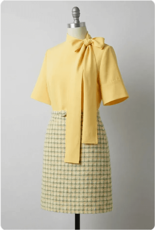 Mannequin still life: Yellow bow blouse & tweed skirt set